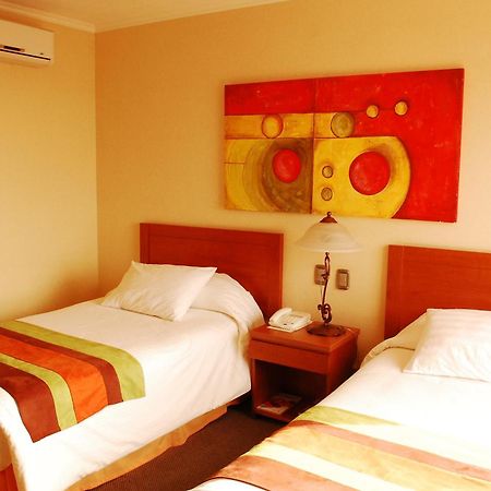 Hotel Florencia Suites & Apartments Antofagasta Szoba fotó